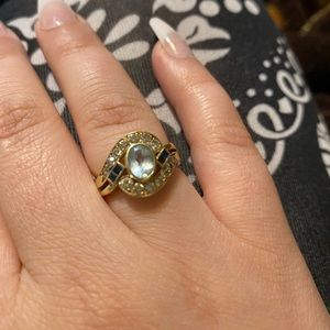 14k ring with diamonds, topaz and sapphires